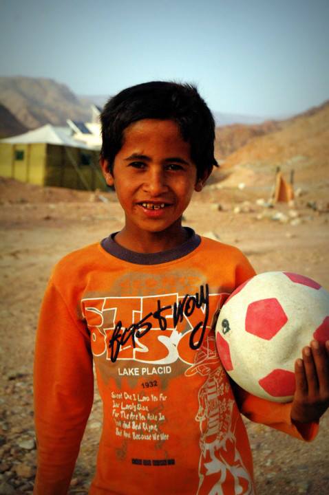 Playing football in the Dana Biosphere in Jordan - by photographer Kristen Gill